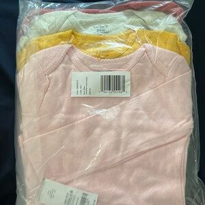 4 pack of long sleeve pointelle onesies- pink, mauve, grey & mustard